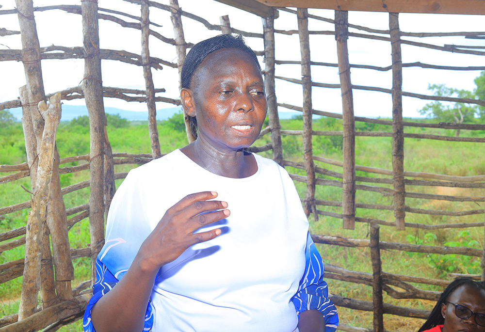Consolata Machuko, a local official from the Ministry of Labour and Social Protection, speaks to residents at a rescue center in the Kilifi region. (GSR photo/Doreen Ajiambo)