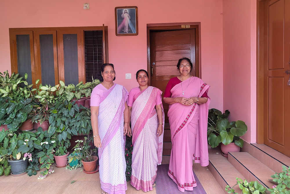 From left: Srs. Elsy Gregory Vettickal, Joicy Joy and Suma Chacko Muthukattuparambil in front of the convent of the Sisters of Charity of Nazareth in Kakkavayal, a village in the Wayanad district of Kerala, India. (George Kommattam)