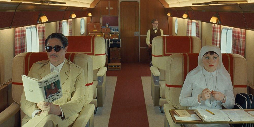 Benicio del Toro plays businessman Zsa-zsa Korda and Mia Threapleton plays his estranged daughter, a nun named Liesl, in Wes Anderson's "The Phoenician Scheme." Benicio del Toro plays businessman Zsa-zsa Korda and Mia Threapleton plays his estranged daughter, a nun named Liesl, in Wes Anderson's "The Phoenician Scheme."
