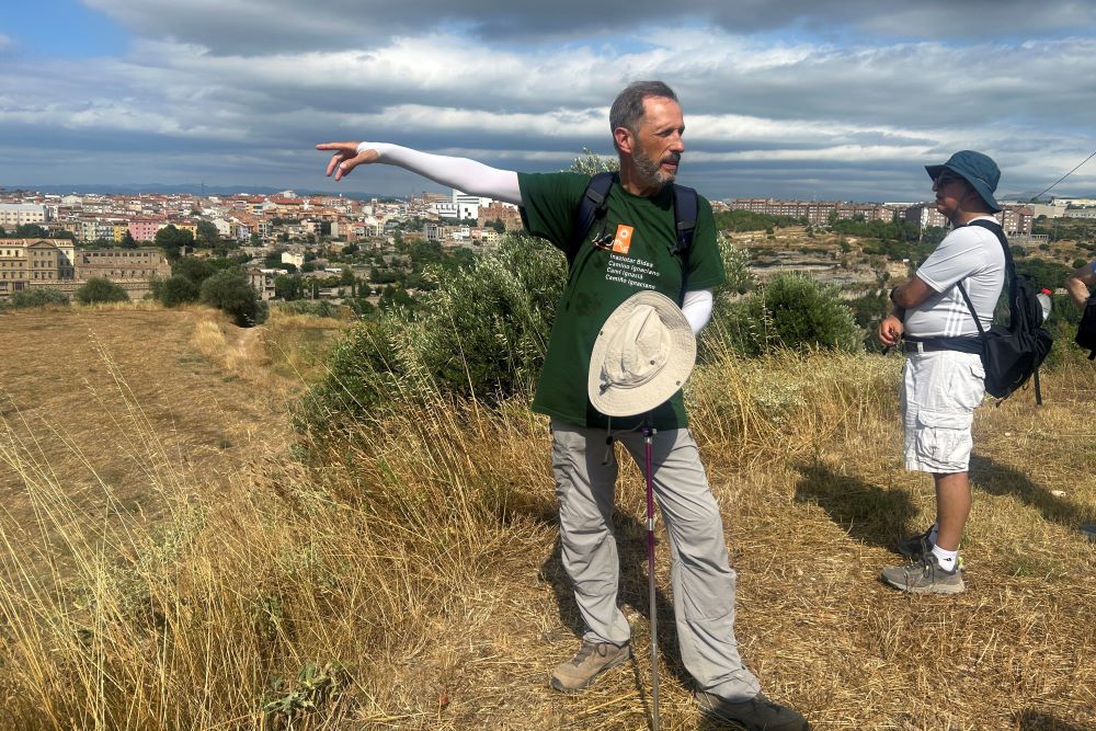 Jesuit Fr. Josep Lluis Iriberri points toward Manresa, Spain. Jesuit Fr. Josep Lluis Iriberri points toward Manresa, Spain.