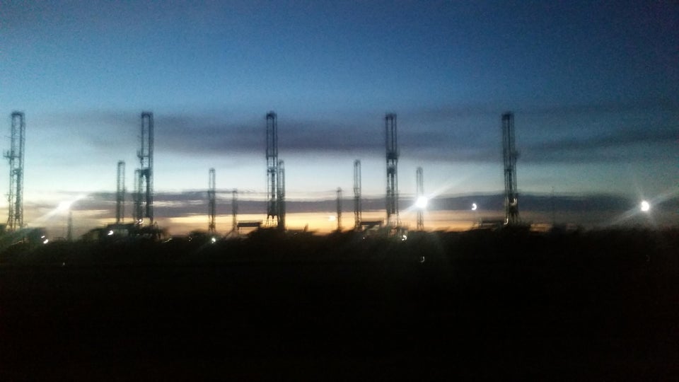 Drilling rigs park in the Permian Basin outside Odessa, Texas. 