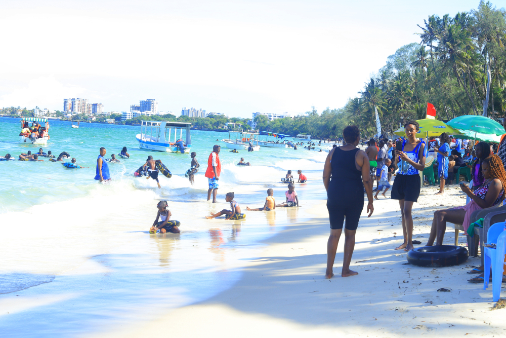 People at Pirates Beach in Mombasa People enjoy the sun and surf at Pirates Beach in Mombasa. (GSR photo/Doreen Ajiambo)