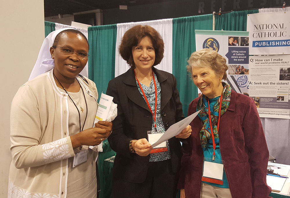 Sr. Jane Wakahiu, associate vice president of program operations and head of the Catholic Sisters Initiative at the Conrad N. Hilton Foundation, Gail DeGeorge, and Sr. Joyce Meyer, co-founder of Global Sisters Report, at the LCWR Assembly in 2023 (Courtesy of Gail DeGeorge)