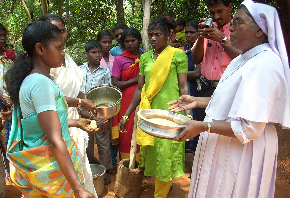 Sr. Innocent Joseph Ayyankanal, a member of the Missionary Sisters of Mary Immaculate, teaches tribal communities how to prepare herbal medicines at their homes in the Wayanad district of Kerala, southwestern India. (Courtesy of Sr. Innocent Ayyankanal)