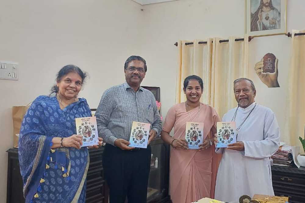 Sr. Lini Sheeja’s book, Sound of Silence Sr. Lini Sheeja’s book, Sound of Silence, written in Malayalam, was released in 2025 by Archbishop Peter Machado of Bangalore (right). Sr. Lini Sheeja is pictured second from right. (Courtesy of Sr. Lini Sheeja)