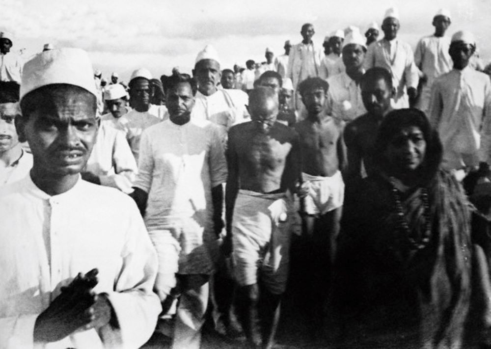 Mohandas Gandhi and others walk during a peaceful protest in 1930. Mohandas Gandhi and others walk during a peaceful protest in 1930.