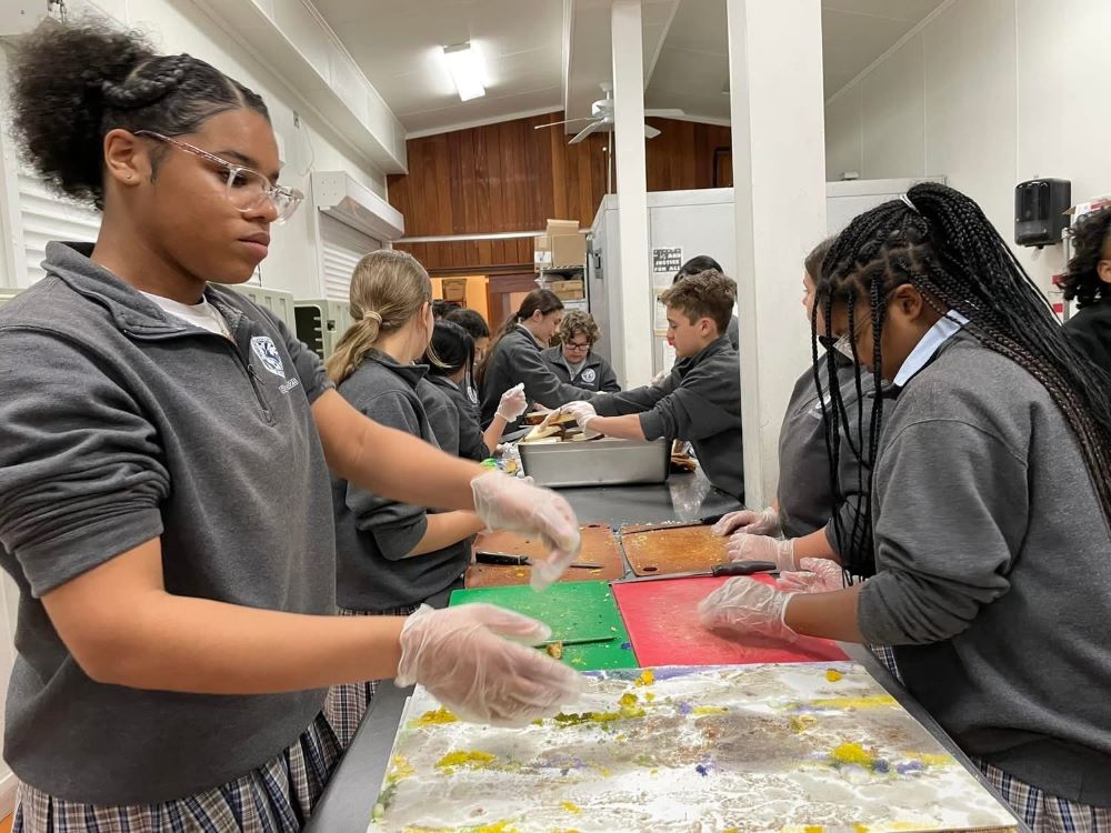 Students prepare lunches at the Rebuild Center in New Orleans. Students prepare lunches at the Rebuild Center in New Orleans.