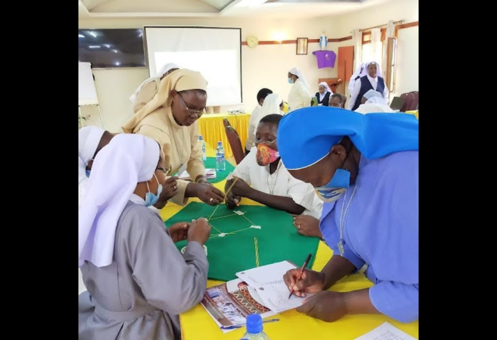 Participants take part in a program training activity on teamwork during the Professional Development for Congregational Leaders program. Designed by African leaders for African leaders, the program recognizes the realities of religious leadership in Africa and offers women religious the skills to lead with faith, resilience and collaboration. (Courtesy of Catherine Cingii)