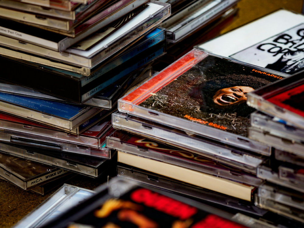 (Unsplash/Brett Jordan) A messy stack of CDs