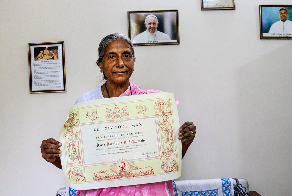 Dora D'Rozario, coordinator of the Order of Consecrated Virgins  in Bangladesh, shows her Pro Ecclesia et Pontifice Award from Pope Leo XIV in January. (Stephan Uttom Rozario)
