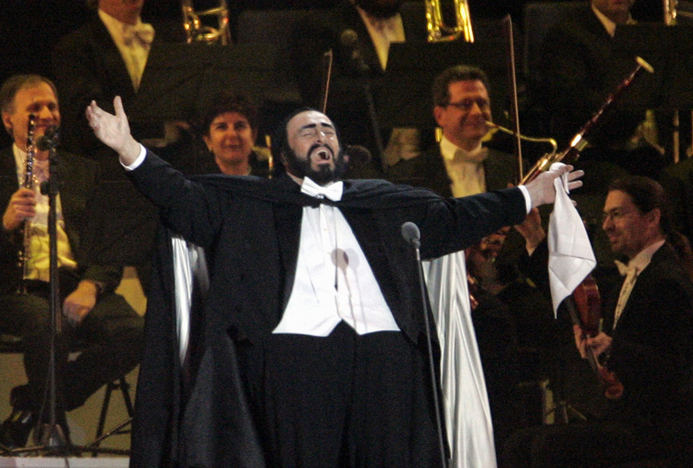 Tenor Luciano Pavarotti performs during the opening ceremony for the 2006 Winter Olympics in Turin, Italy, Feb. 10, 2006. (AP/Matt Dunham)
