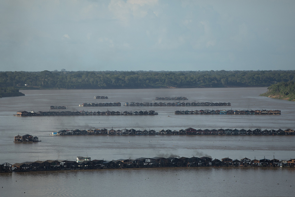 Gold mining rafts and dredges are seen on the Madeira River in Brazil. (Greenpeace Brazil/Bruno Kelly)