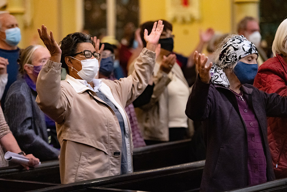 People in Baltimore attend All Saints' Day Mass at St. Ann Church Nov. 1. (CNS/Catholic Review/Kevin J. Parks) People in Baltimore attend All Saints' Day Mass at St. Ann Church Nov. 1. (CNS/Catholic Review/Kevin J. Parks)