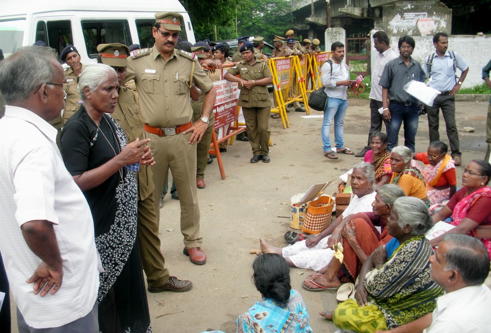 Gonzaga Sr. Anthonysami Alphonsa, standing between officers at left, addresses a meeting of Dalits in a village in the southern state of Tamil Nadu, India. (Provided photo) Gonzaga Sr. Anthonysami Alphonsa, standing between officers at left, addresses a meeting of Dalits in a village in the southern state of Tamil Nadu, India. (Provided photo)