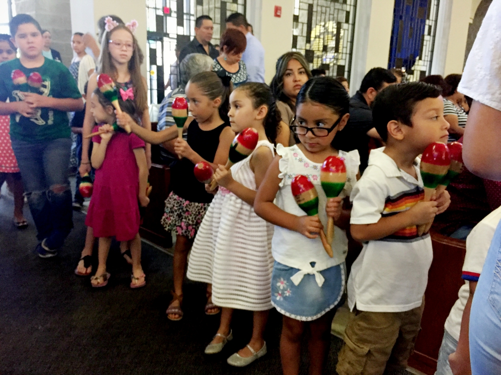 A Mass at St. Mark Church in El Paso, Texas, begins with children leading the procession with maracas. (NCR photo/Soli Salgado) A Mass at St. Mark Church in El Paso, Texas, begins with children leading the procession with maracas. (NCR photo/Soli Salgado)