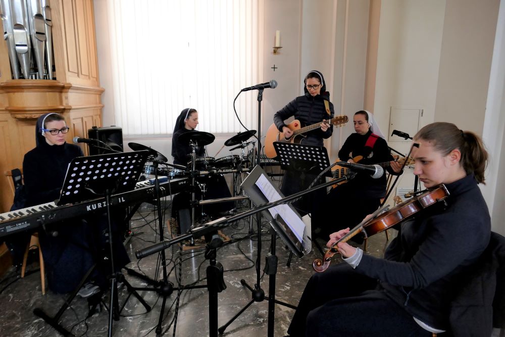 The music group of St. Joseph of Saint-Marc convent in Mukachevo, Ukraine, is made up of, from left, Sister Laura (keyboard), Sister Erika (drums), Sister Christina (guitar), Sister Marina (vocals) and Sister Natalka (violin).