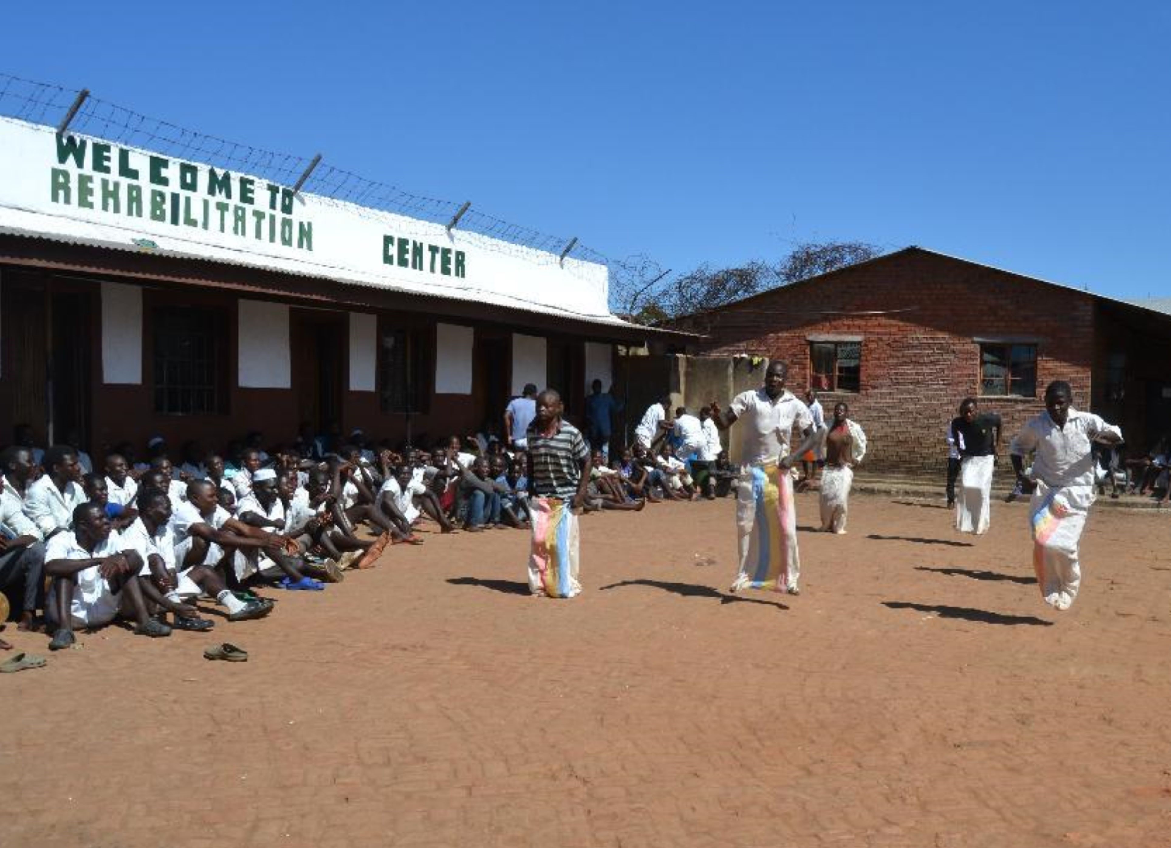 Offenders engage in a dancing session at Chichiri Prison in Malawi, facilitated by Sr. Anna Tommasi. Mental health initiatives are inadequate and chronically underfunded in Malawi’s prisons.