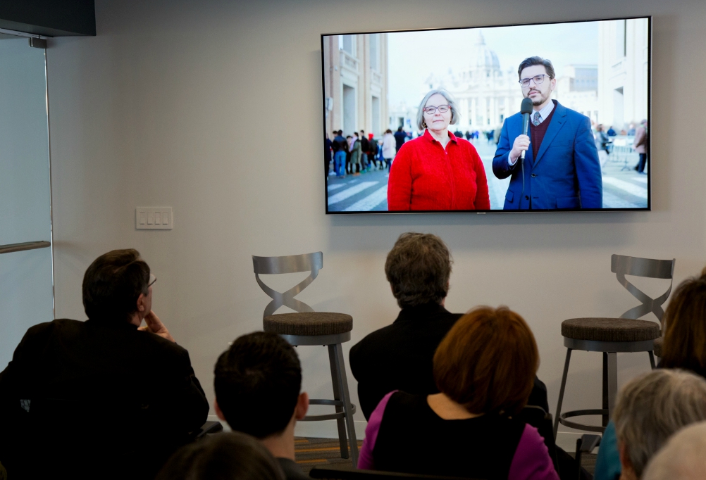 Cindy Wooden and Joshua McElwee, Rome correspondents for Catholic News Service and NCR, respectively, speak in a welcome video at the March 13 panel discussion of "A Pope Francis Lexicon." (Center of Concern/Michael Carpenter Photography) Cindy Wooden and Joshua McElwee, Rome correspondents for Catholic News Service and NCR, respectively, speak in a welcome video at the March 13 panel discussion of "A Pope Francis Lexicon." (Center of Concern/Michael Carpenter Photography)