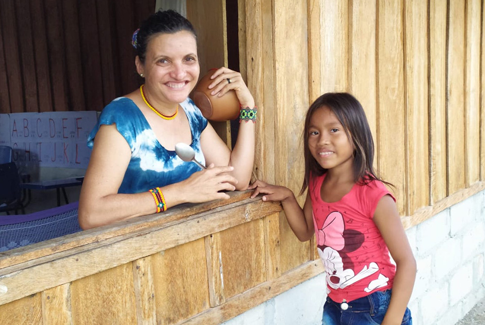 Sr. Maria Aparecida Marques Fernandes, a Franciscan Catechist, has a face-to-face conversation with a girl from the Curicuriari Tribe from her home in São Gabriel da Cachoeira, Brazil, in November 2020. (Courtesy of Fr. Maurizio Setti) Sr. Maria Aparecida Marques Fernandes, a Franciscan Catechist, has a face-to-face conversation with a girl from the Curicuriari Tribe from her home in São Gabriel da Cachoeira, Brazil, in November 2020. (Courtesy of Fr. Maurizio Setti)