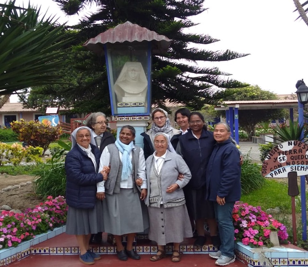 Sr. Hilda Bernath, second from right in second line, on her first visit with her Franciscan Missionaries of Mary sisters in the Ancon District of northern Lima, Peru. The sisters work with women and children in the village and are here visiting a shrine t Sr. Hilda Bernath, second from right in second line, on her first visit with her Franciscan Missionaries of Mary sisters in the Ancon District of northern Lima, Peru. The sisters work with women and children in the village and are here visiting a shrine t