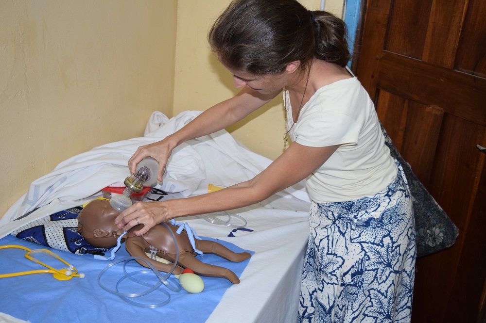 Maryknoll Lay Missioner Anne Berry demonstrates emergency care in the skills lab at Bukumbi Hospital's maternity ward in Tanzania. Maryknoll Lay Missioner Anne Berry demonstrates emergency care in the skills lab at Bukumbi Hospital's maternity ward in Tanzania.