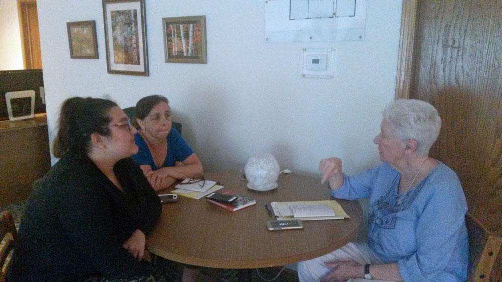Bethany House of Hospitality staff meet June 19, 2018, at Bethany House in Bartlett, Illinois; from left: Jessica Alaniz, staff case manager, Darlene Gramigna, executive director, and Benedictine Sr. Patricia Crowley, founder. Bethany House of Hospitality staff meet June 19, 2018, at Bethany House in Bartlett, Illinois; from left: Jessica Alaniz, staff case manager, Darlene Gramigna, executive director, and Benedictine Sr. Patricia Crowley, founder.