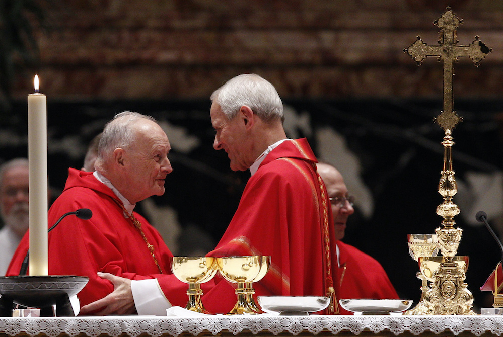 Cardinal Donald Wuerl of Washington, D.C., right, greets then-Cardinal Theodore McCarrick, retired archbishop of Washington, during the sign of peace at a Mass of thanksgiving in St. Peter's Basilica at the Vatican Nov. 22, 2010. (CNS/Paul Haring) Cardinal Donald Wuerl of Washington, D.C., right, greets then-Cardinal Theodore McCarrick, retired archbishop of Washington, during the sign of peace at a Mass of thanksgiving in St. Peter's Basilica at the Vatican Nov. 22, 2010. (CNS/Paul Haring)