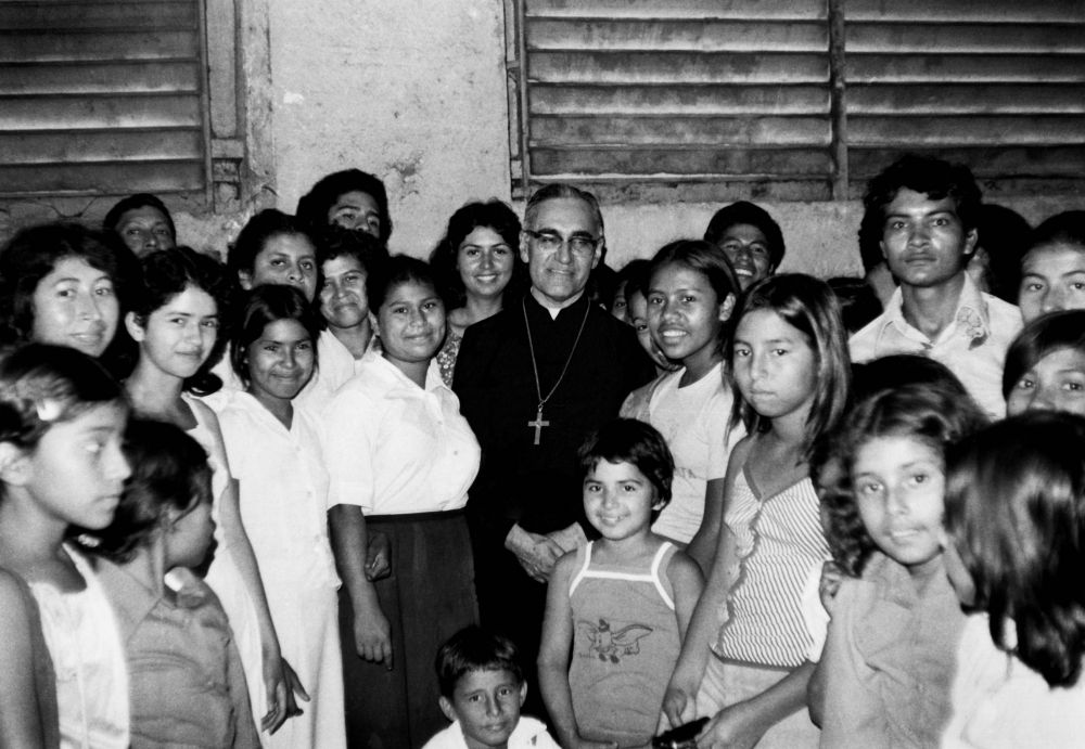 Óscar Romero with women and children Óscar Romero with women and children