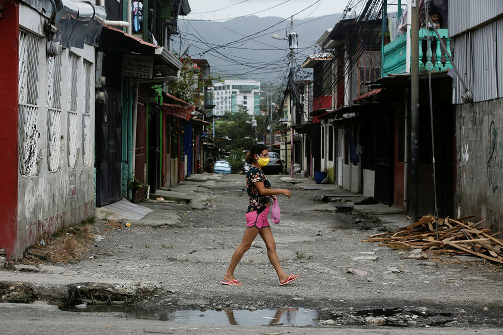 A woman wearing a face mask walks after taking a test for the coronavirus in San José, Costa Rica, June 26. (CNS/Reuters/Juan Carlos Ulate) A woman wearing a face mask walks after taking a test for the coronavirus in San José, Costa Rica, June 26. (CNS/Reuters/Juan Carlos Ulate)