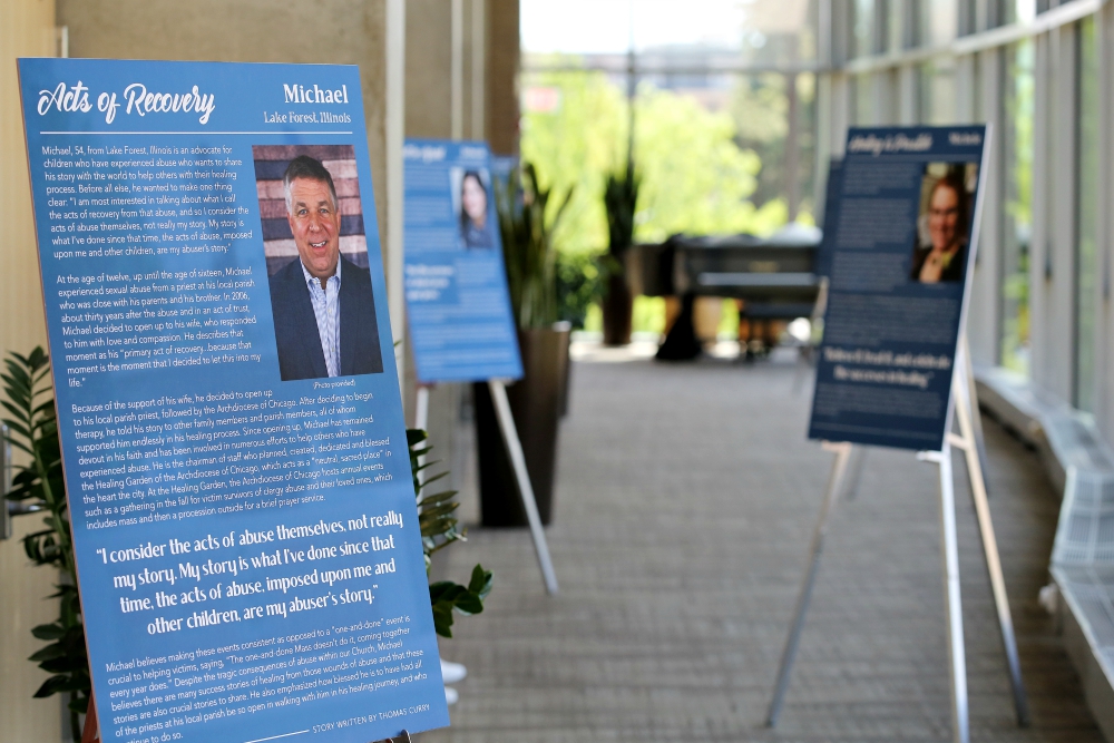 A panel in an exhibit at the Catholic University of America in Washington April 24 tells an abuse survivor's story. (CNS/Bob Roller)