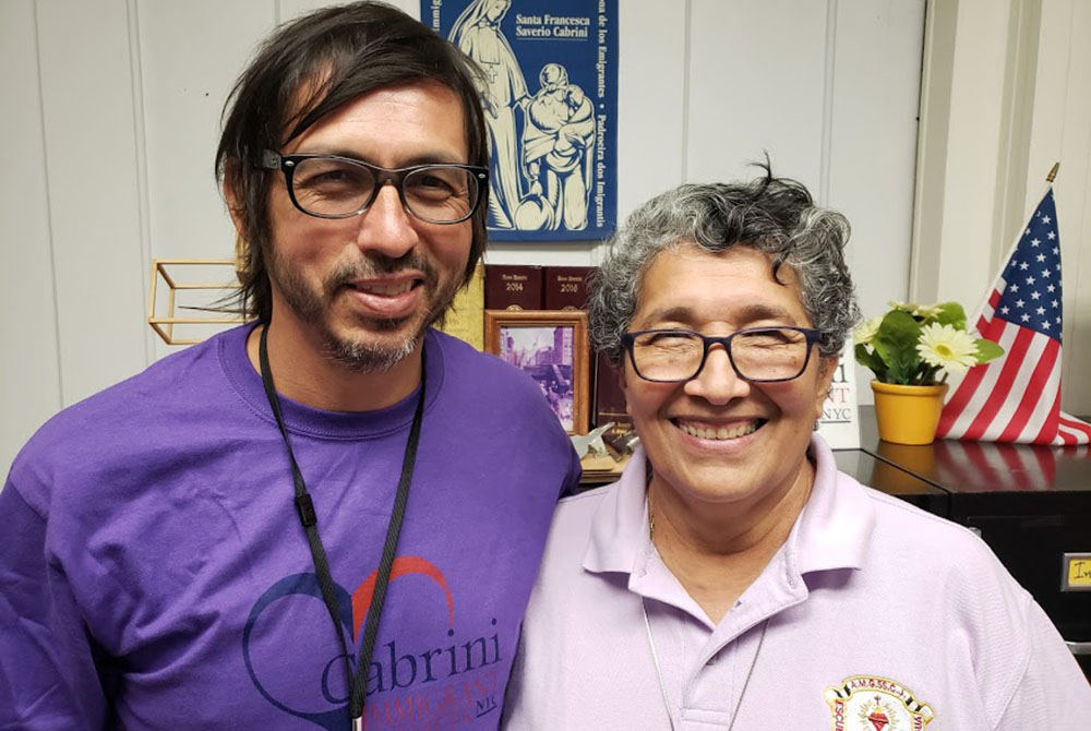 Javier Ramirez Baron, left, Cabrini Immigrant Services executive director, and Sr. Yolanda Flores, a Nicaragua-born member of the Missionary Sisters of the Sacred Heart of Jesus and Cabrini's family program coordinator, in 2019. (GSR photo/Chris Herlinger Javier Ramirez Baron, left, Cabrini Immigrant Services executive director, and Sr. Yolanda Flores, a Nicaragua-born member of the Missionary Sisters of the Sacred Heart of Jesus and Cabrini's family program coordinator, in 2019. (GSR photo/Chris Herlinger
