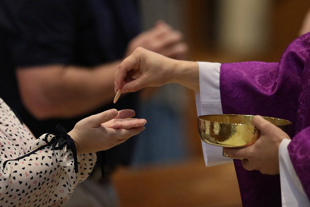 Although there are advantages to online Masses, such as availability of worship at any time, plus the choice of a homilist, there is the "hole" at Communion time. (CNS/The Register/Karen Bonar) Although there are advantages to online Masses, such as availability of worship at any time, plus the choice of a homilist, there is the "hole" at Communion time. (CNS/The Register/Karen Bonar)