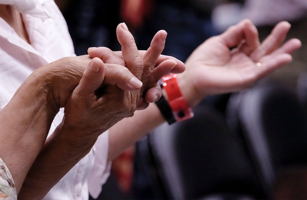 Catholics hold hands during a 2016 Mass in Sioux City, Iowa. (CNS/Catholic Globe/Jerry L. Mennenga) Catholics hold hands during a 2016 Mass in Sioux City, Iowa. (CNS/Catholic Globe/Jerry L. Mennenga)