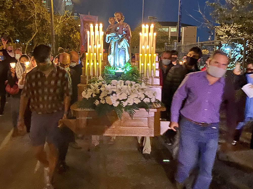 Several men carry a large statue of St. Joseph during the 2021 St. Joseph's Day procession hosted by St. Joseph Catholic Church in Houston. (Courtesy of Virginia Fraguio) Several men carry a large statue of St. Joseph during the 2021 St. Joseph's Day procession hosted by St. Joseph Catholic Church in Houston. (Courtesy of Virginia Fraguio)