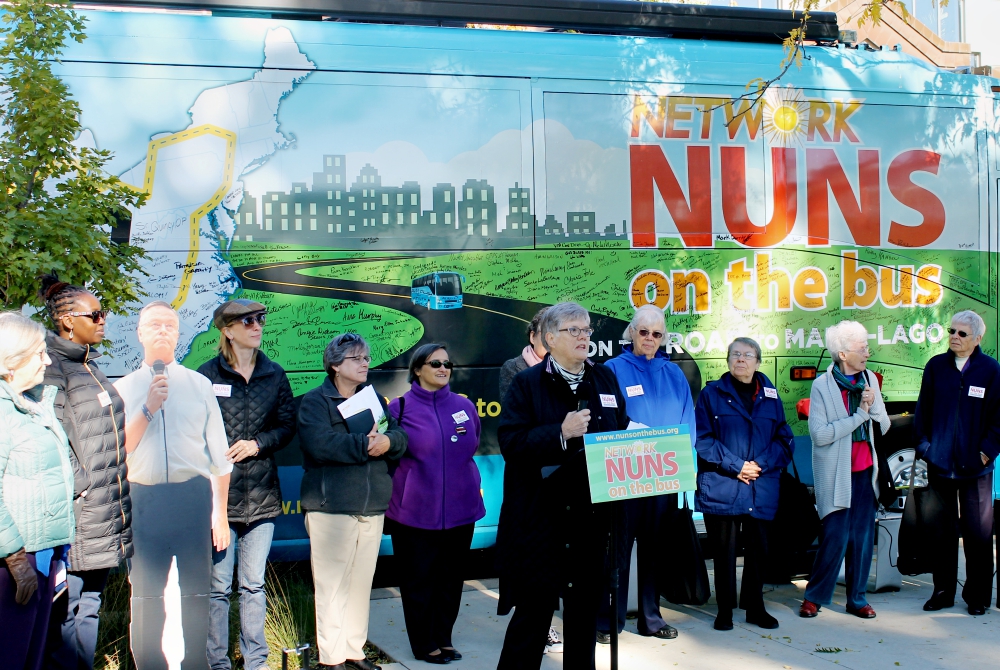 Mercy Sr. Kathy Thornton speaks at a Nuns on the Bus rally in Greene Square in Cedar Rapids, Iowa, Oct. 17. Second from left is a cardboard cutout of Republican Rep. Rod Blum. (NCR photo/Brian Roewe) Mercy Sr. Kathy Thornton speaks at a Nuns on the Bus rally in Greene Square in Cedar Rapids, Iowa, Oct. 17. Second from left is a cardboard cutout of Republican Rep. Rod Blum. (NCR photo/Brian Roewe)