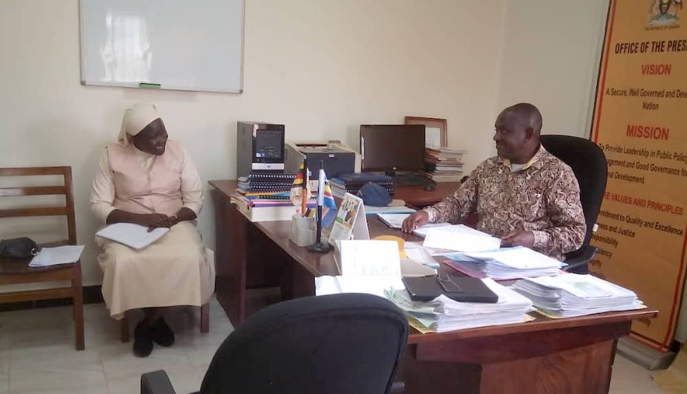 Sr. Mary Grace Akiror questions Lt. Col. James Mwesigye, the Mbarara District resident district commissioner, on the progress of government programs and corruption-related issues. (Gerald Matembu) Sr. Mary Grace Akiror questions Lt. Col. James Mwesigye, the Mbarara District resident district commissioner, on the progress of government programs and corruption-related issues. (Gerald Matembu)