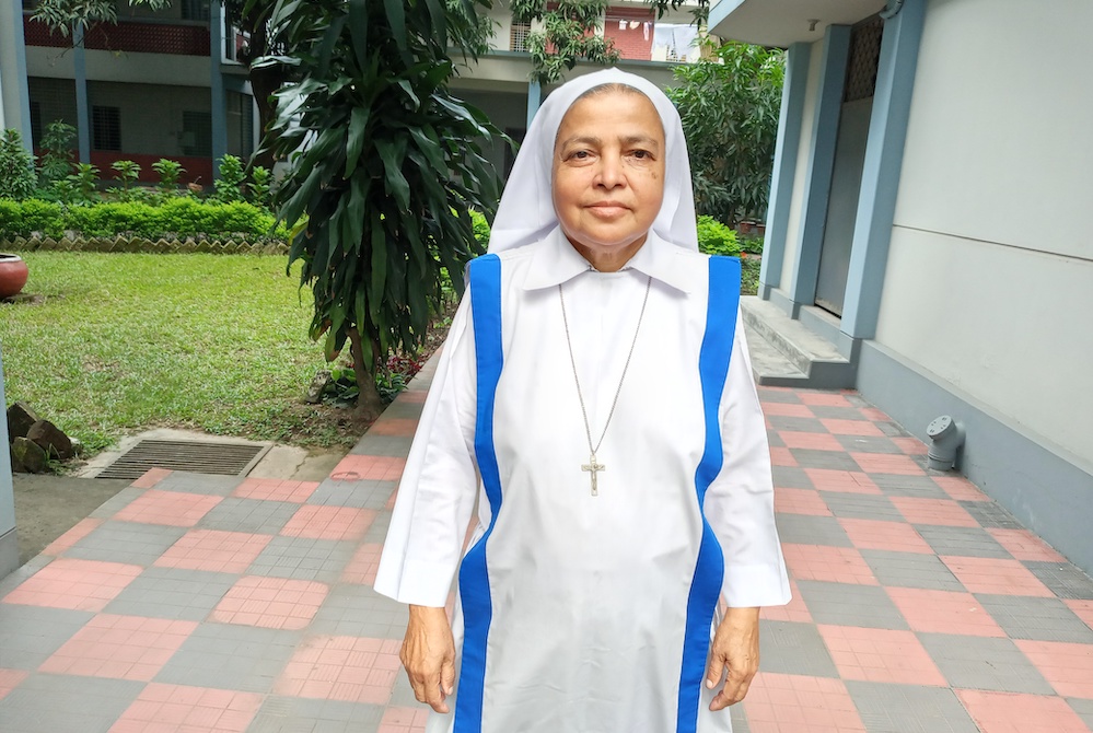 Sr. Mary Nibedita is pictured outside at the Associates of Mary, Queen of Apostles convent Mary House in Dhaka, Bangladesh. (Sumon Corraya) Sr. Mary Nibedita is pictured outside at the Associates of Mary, Queen of Apostles convent Mary House in Dhaka, Bangladesh. (Sumon Corraya)