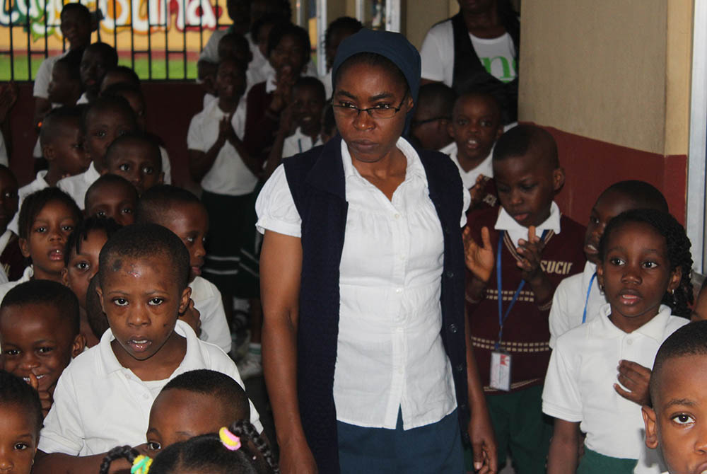 Sr. Martha Oko prepares the pupils on the assembly ground for morning devotion at St. Vincent's Centre for Inclusive Education, run by the Daughters of Charity in Uyo, state capital of Akwa Ibom in Southern Nigeria. (Kelechukwu Iruoma) Sr. Martha Oko prepares the pupils on the assembly ground for morning devotion at St. Vincent's Centre for Inclusive Education, run by the Daughters of Charity in Uyo, state capital of Akwa Ibom in Southern Nigeria. (Kelechukwu Iruoma)