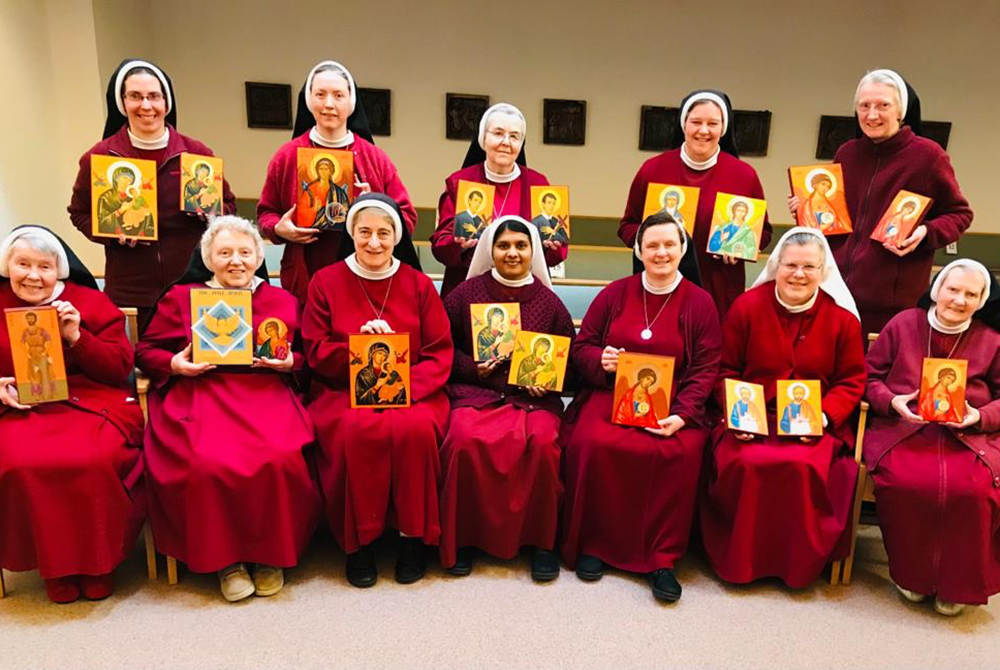 Members of the Redemptoristine Nuns of Dublin with the icons they sell online as a way to supplement their income while demand for altar breads, their main source of income, remains low because of the COVID-19 pandemic. (Courtesy of Sr. Lucy Conway) Members of the Redemptoristine Nuns of Dublin with the icons they sell online as a way to supplement their income while demand for altar breads, their main source of income, remains low because of the COVID-19 pandemic. (Courtesy of Sr. Lucy Conway)