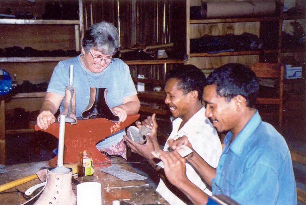 Sr. Susan Gubbins makes a prosthesis with men during her ministry in East Timor. (Courtesy of Susan Gubbins) Sr. Susan Gubbins makes a prosthesis with men during her ministry in East Timor. (Courtesy of Susan Gubbins)