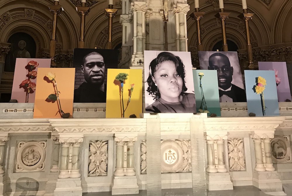 Past view of altar of St. Francis Xavier Church, with photograph of George Floyd, Breonna Taylor and Ahmaud Arbery (Courtesy of St. Francis Xavier Church) Past view of altar of St. Francis Xavier Church, with photograph of George Floyd, Breonna Taylor and Ahmaud Arbery (Courtesy of St. Francis Xavier Church)