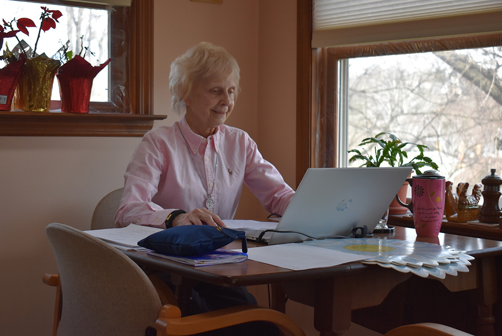 Sr. Suzanne Susany of the Sisters of St. Francis of the Neumann Communities assists immigrants from home in Pittsburgh during the pandemic. (Julie A. Ferraro) Sr. Suzanne Susany of the Sisters of St. Francis of the Neumann Communities assists immigrants from home in Pittsburgh during the pandemic. (Julie A. Ferraro)