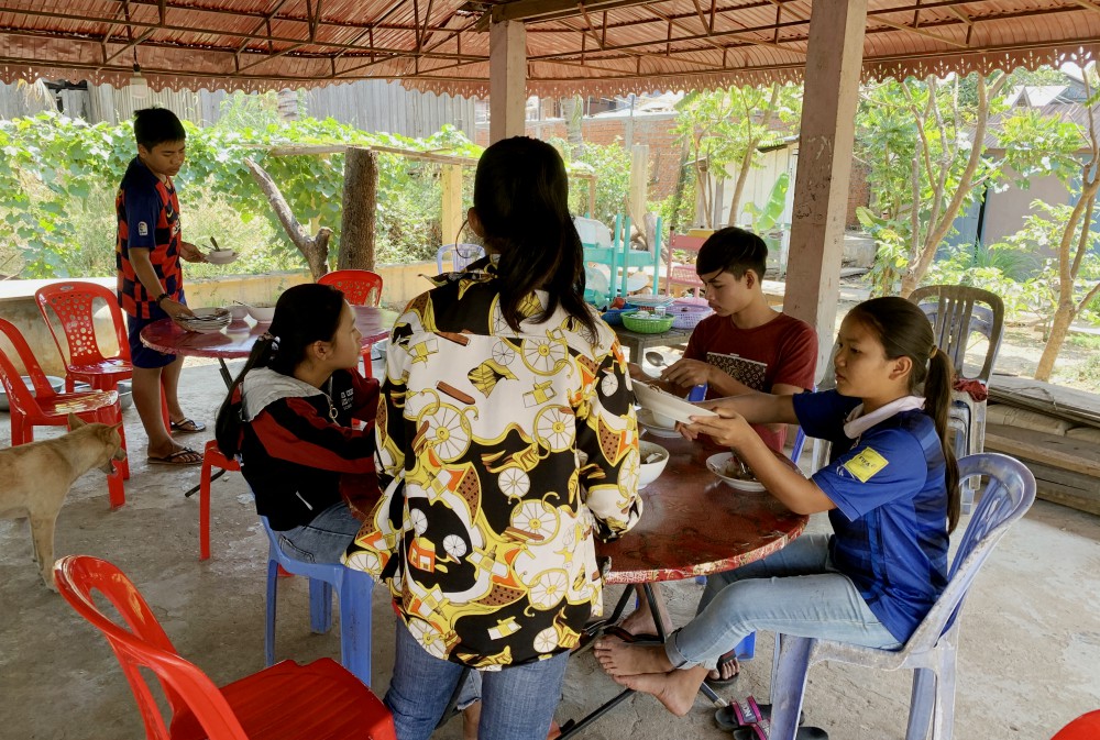 Young people finish lunch and help with chores at the Catholic youth center in Stung Treng, Cambodia. Located a little more than a mile from the church, the center has a dormitory, a study room and dining room. (Akarath Soukhaphon) Young people finish lunch and help with chores at the Catholic youth center in Stung Treng, Cambodia. Located a little more than a mile from the church, the center has a dormitory, a study room and dining room. (Akarath Soukhaphon)