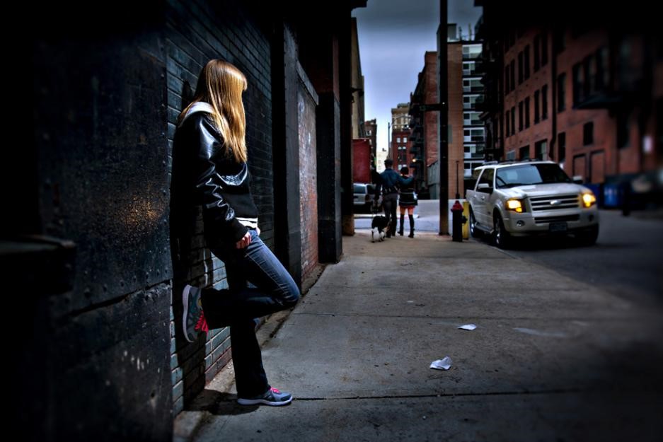 Photo illustration of young woman being trafficked. Photo illustration of young woman being trafficked.