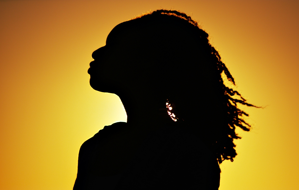 Black woman in silhouette (Dreamstime/Mark Adams) Black woman in silhouette (Dreamstime/Mark Adams)