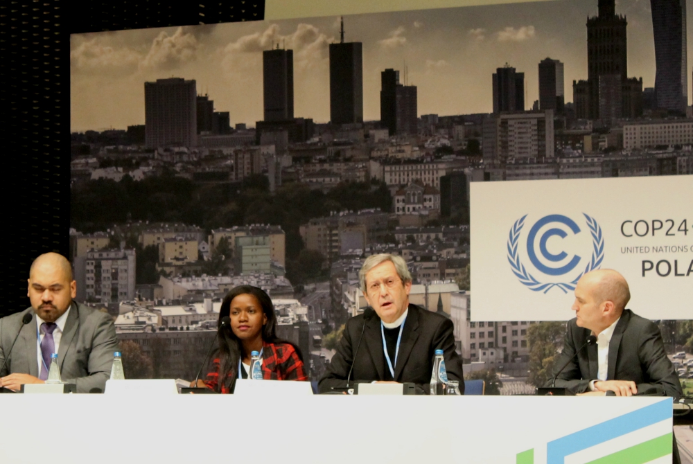 Msgr. Bruno-Marie Duffé, second from right, speaks at a press conference Dec. 12 in Katowice, Poland. With him are, from left, Joseph Sapati Moeono-Kolio, Mercy Chirambo and Neil Thorns. (NCR photo/Brian Roewe) Msgr. Bruno-Marie Duffé, second from right, speaks at a press conference Dec. 12 in Katowice, Poland. With him are, from left, Joseph Sapati Moeono-Kolio, Mercy Chirambo and Neil Thorns. (NCR photo/Brian Roewe)