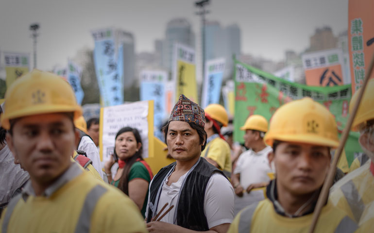 Migrant workers from Nepal take part in a Labor Day rally in Hong Kong on May 1. (AFP/Getty Images/Philippe Lopez)