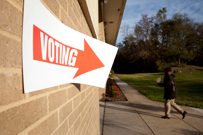 A woman arrives early to vote at a polling place at the Ukrainian Catholic National Shrine in Washington Nov. 6, 2012. (CNS/Nancy Phelan Wiechec)