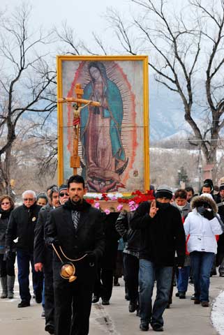 Today is the feast day of Our Lady of Guadalupe. A man swings a censer during a procession with an image of Our Lady of Guadalupe around St. Mary Cathedral before the annual celebration in downtown Colorado Springs, Colo., Dec. 9.