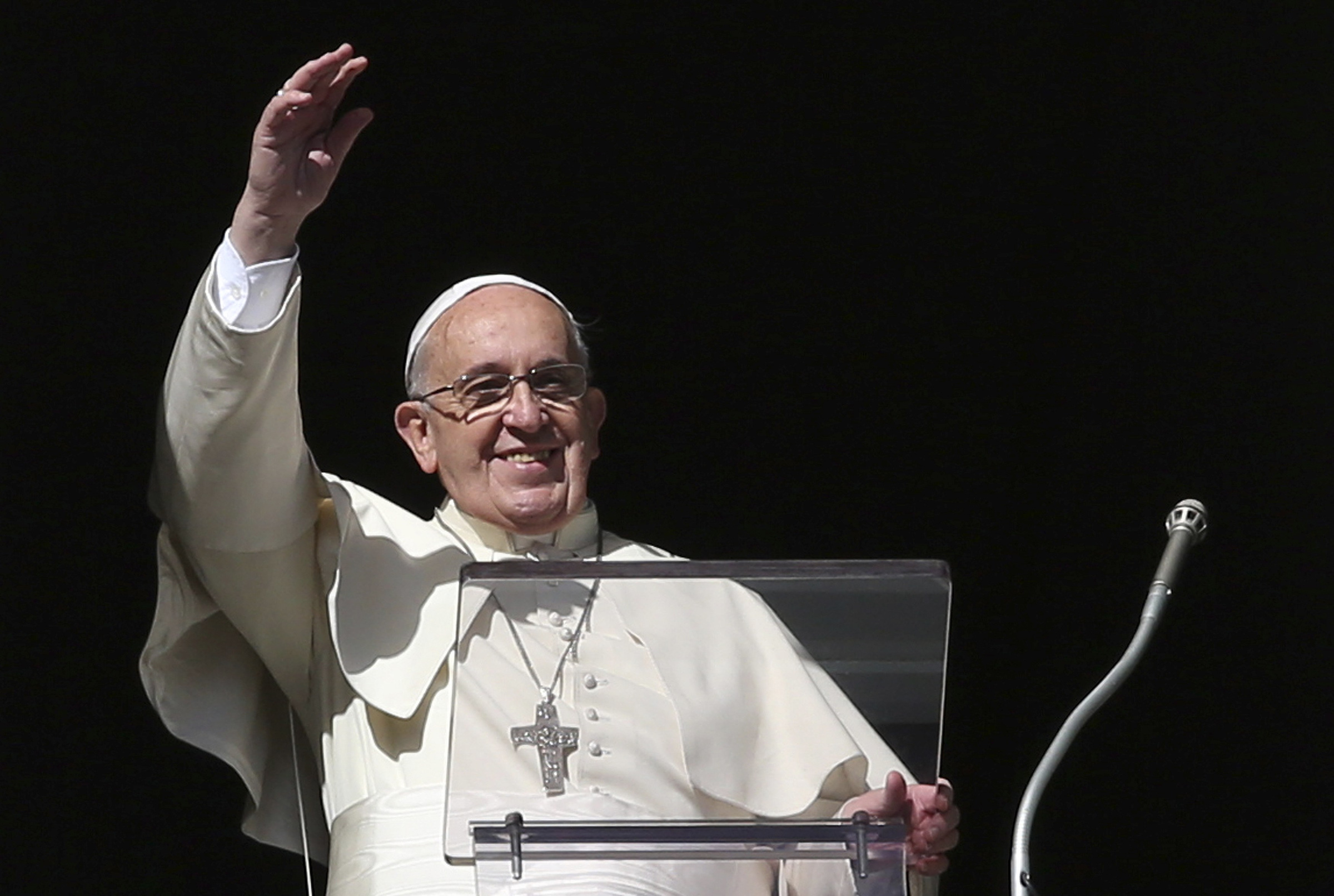 Pope Francis waves during his Angelus prayer in St. Peter's Square at the Vatican Nov. 16. The following day, Pope Francis confirmed he will visit Philadelphia in September for the World Meeting of Families. (CNS/Reuters/Alessandro Bianchi)